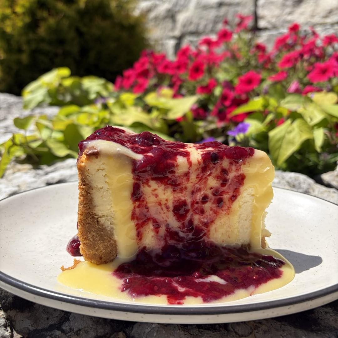 House cheesecake with berry compote