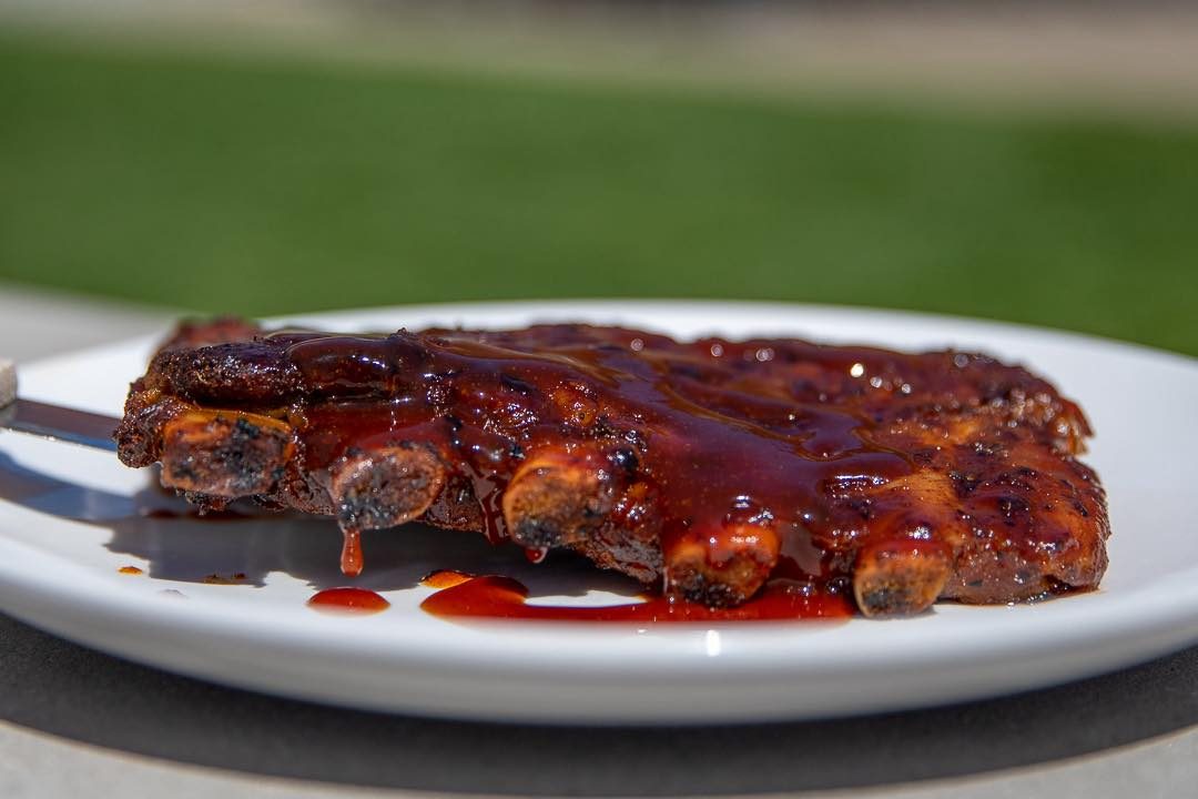 Slow-smoked BBQ ribs at The South Street Grille